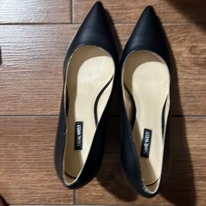 Brand new Nine West black blocked heel pumps. Never worn.